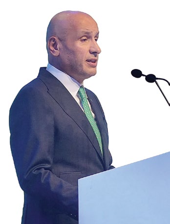 Ticaret Bakanı Prof. Dr. Ömer Bolat kürsüde konuşurken